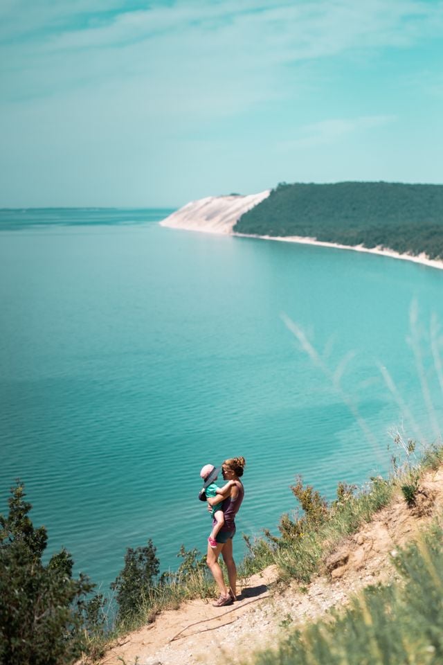 Mother and children enjoying a sunny day at Sleeping Bear Dunes, MI.